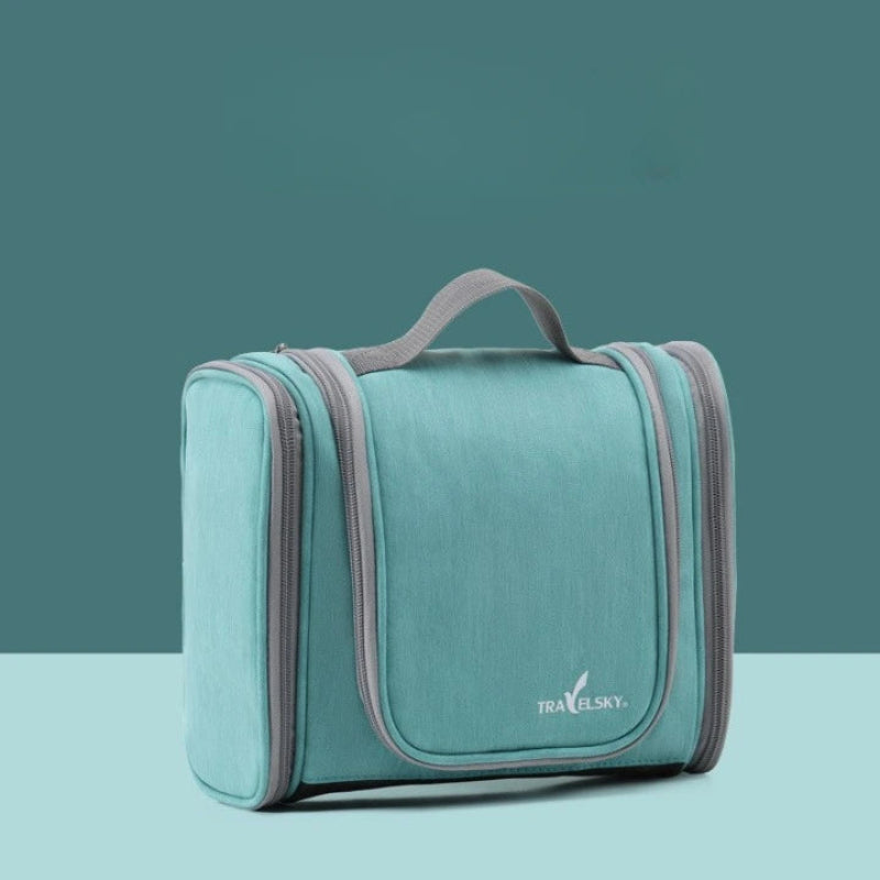 photo de la trousse de toilette turquoise sur un fond turquoise