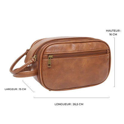 Photo prise de profil d'une trousse de toilette marron clair avec les mesures affichées