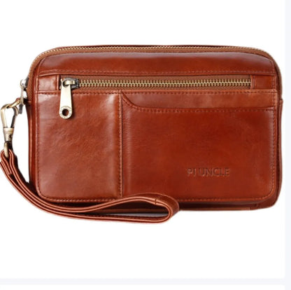 Photo de devant de la trousse de toilette en cuir de chez la marque pi uncle modèle marron rouge